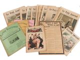a lot of old newspapers that are on the table