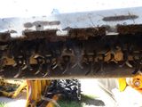 a close up view of a tractor tire with a bunch of clamps attached to it