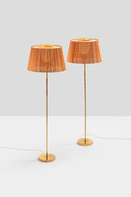 a pair of lamps on a table with a white background