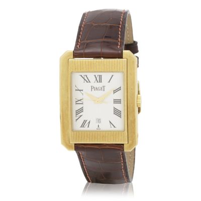 a close up of a wrist watch with roman numerals on it