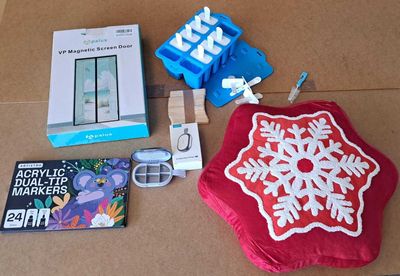 a box with a snowflake on it and other items on the table