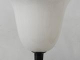 an image of a table lamp with a white glass shade