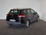 a picture of a black car parked in a room