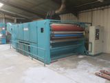 a large machine that is working in a factory