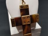 gold plated cross pendant with a tortoise shell in the center