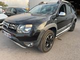 a picture of a black dacia parked in a parking lot