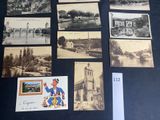 many old photos of a town on display on a table