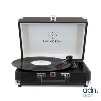 a close up of a suitcase with a record player inside of it