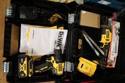 a tool box with tools in it on a table