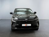 the front view of a black car in a white room