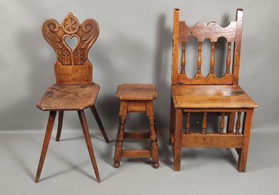 two wooden chairs and a stool sitting next to each other
