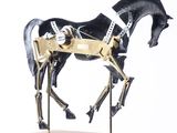 a horse that is standing on a glass table
