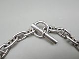 a silver chain with a silver clasp on it