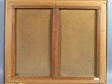 an old painting with a wooden frame on a blue background