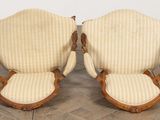 pair of antique french style armchairs with upholstered cushions