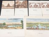 four old postcards of different scenes on a black table