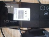 a cell phone that is connected to a computer mouse