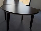an image of a table in a room with a view of the city