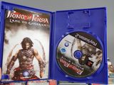 a blu - ray of prince of persia and a video game