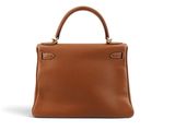a brown leather handbag on a white background