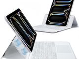 trois vues différentes d'un ordinateur portable équipé d'un clavier