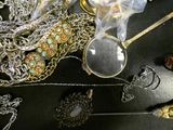 many different types of jewelry on the table