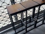 a bird that is sitting on top of a table