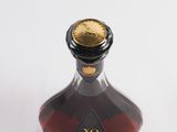 a bottle of alcohol that is sitting on a table