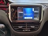 a picture of a car dashboard with a display on it