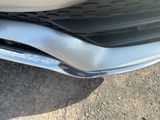 a close up of the front bumper of a car