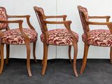 three chairs sitting next to each other on the floor