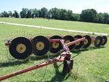 a row of plow in the middle of a field