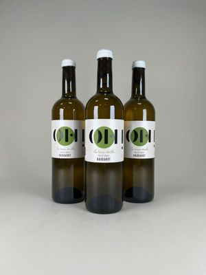 three bottles of olive oil on a white background