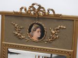a mirror with a picture of a woman on it