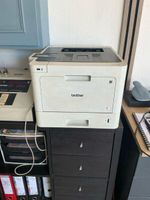 Une imprimante laser couleur de marque Brother, modèle HL-L8…