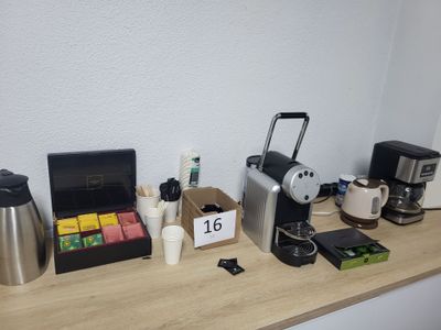 many different types of coffee and teas on the counter