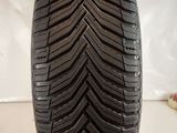 a close up of a tire on a white surface