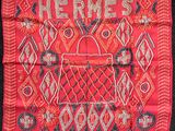 red and blue embroidered scarf with a purse and flowers on it