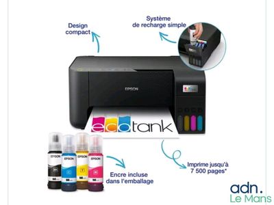 a close up of a printer with ink and ink bottles on it