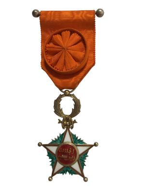 une image représentant une médaille sur laquelle figure une étoile