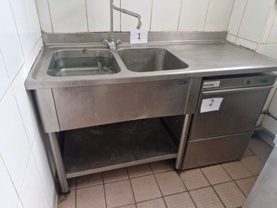 a stainless steel sink and dishwasher in a kitchen