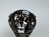 a metal bowl that has a label on it