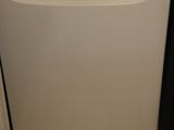 a white dishwasher sitting in a kitchen next to a counter