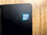 a memory card sitting on top of a laptop computer