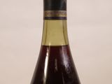 a bottle of wine that is sitting on a table