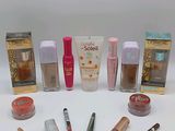 the contents of various cosmetics products are arranged on a white surface