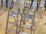 many ladders that are sitting on the floor