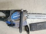 a chainsaw that is laying on the floor
