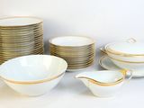 a lot of bowls and bowls that are sitting on a table