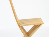 a close up of a wooden chair on a white background